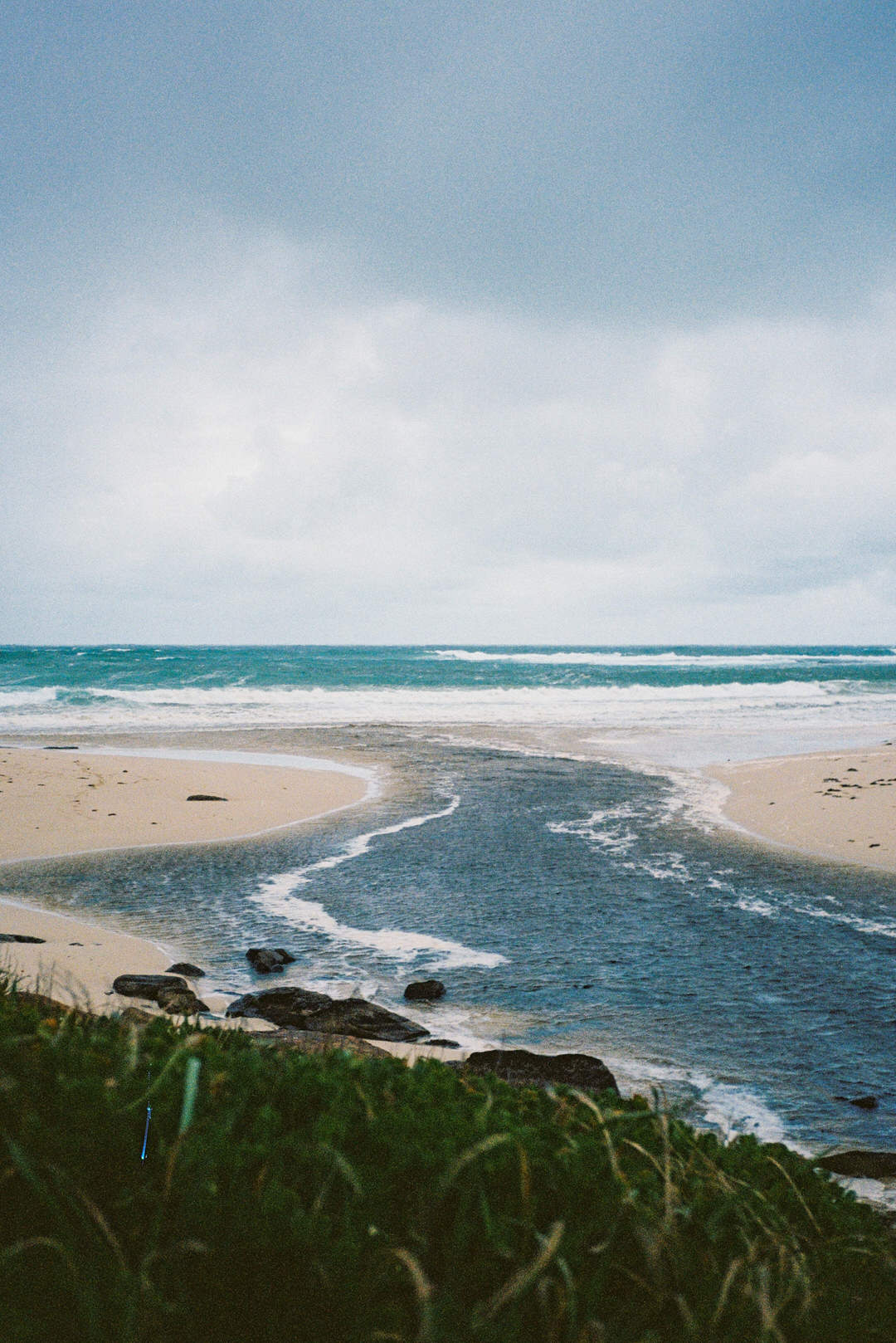 35mm film elopement photography in Margaret River with wild weather and soft light