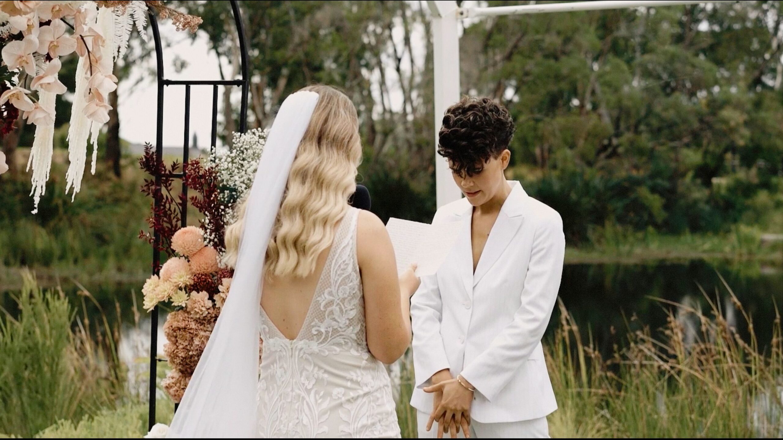 Bride and bride during their coastal wedding ceremony at Parry Beach Breaks in Denmark WA
