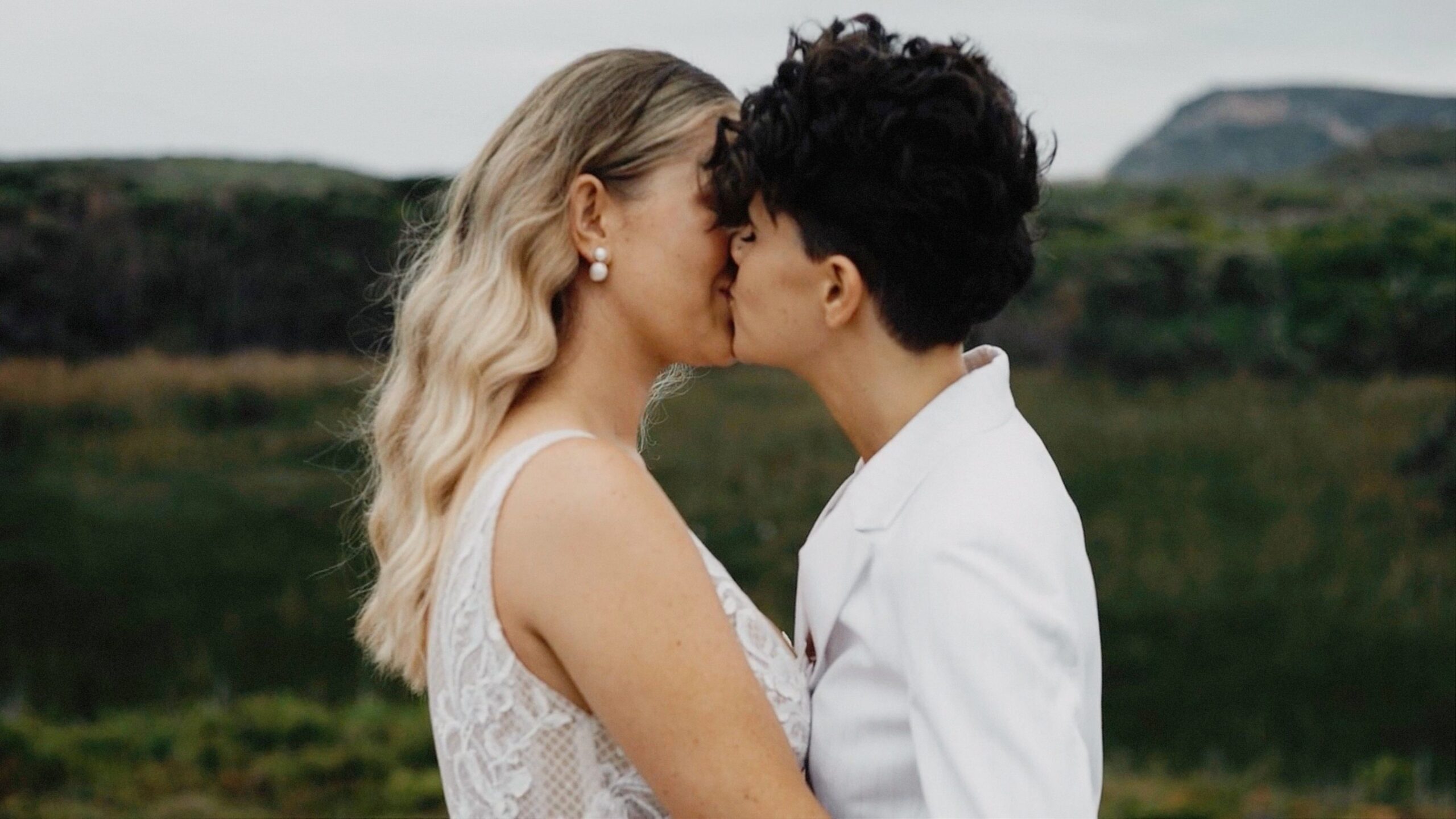 Jesse and Renae kissing during their Parry Beach Breaks wedding in Denmark WA