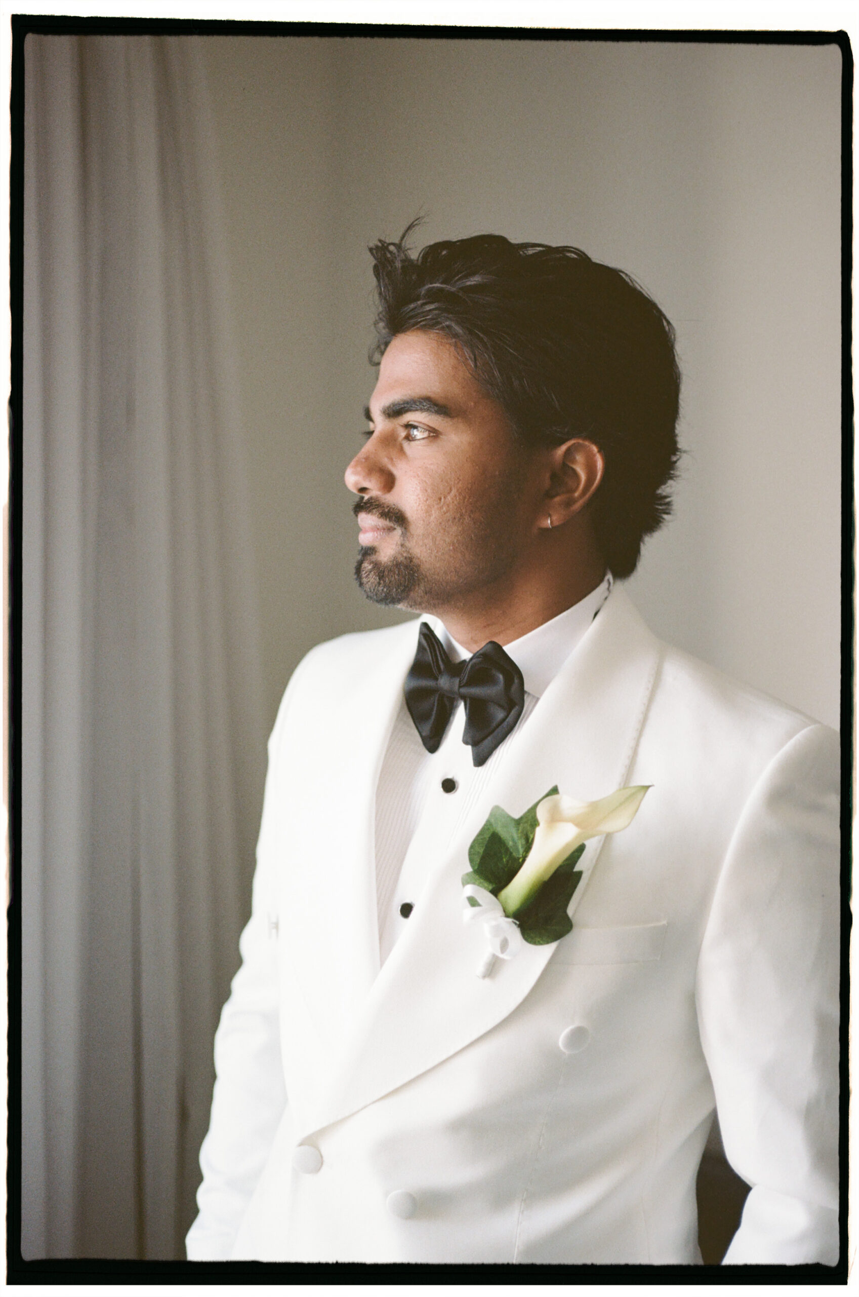 Cinematic wedding portrait of Madhu and Kenny on analogue film