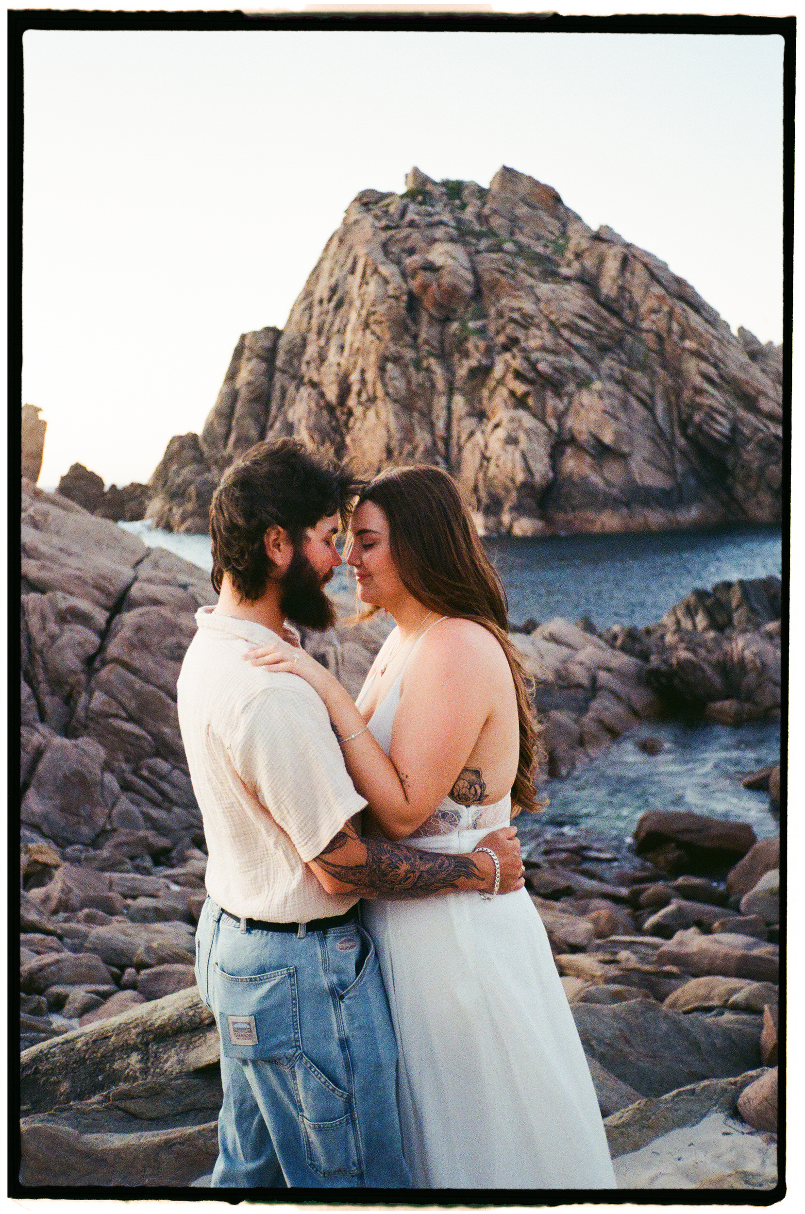 Candid proposal photography at Sugarloaf Rock in Dunsborough on 35mm film