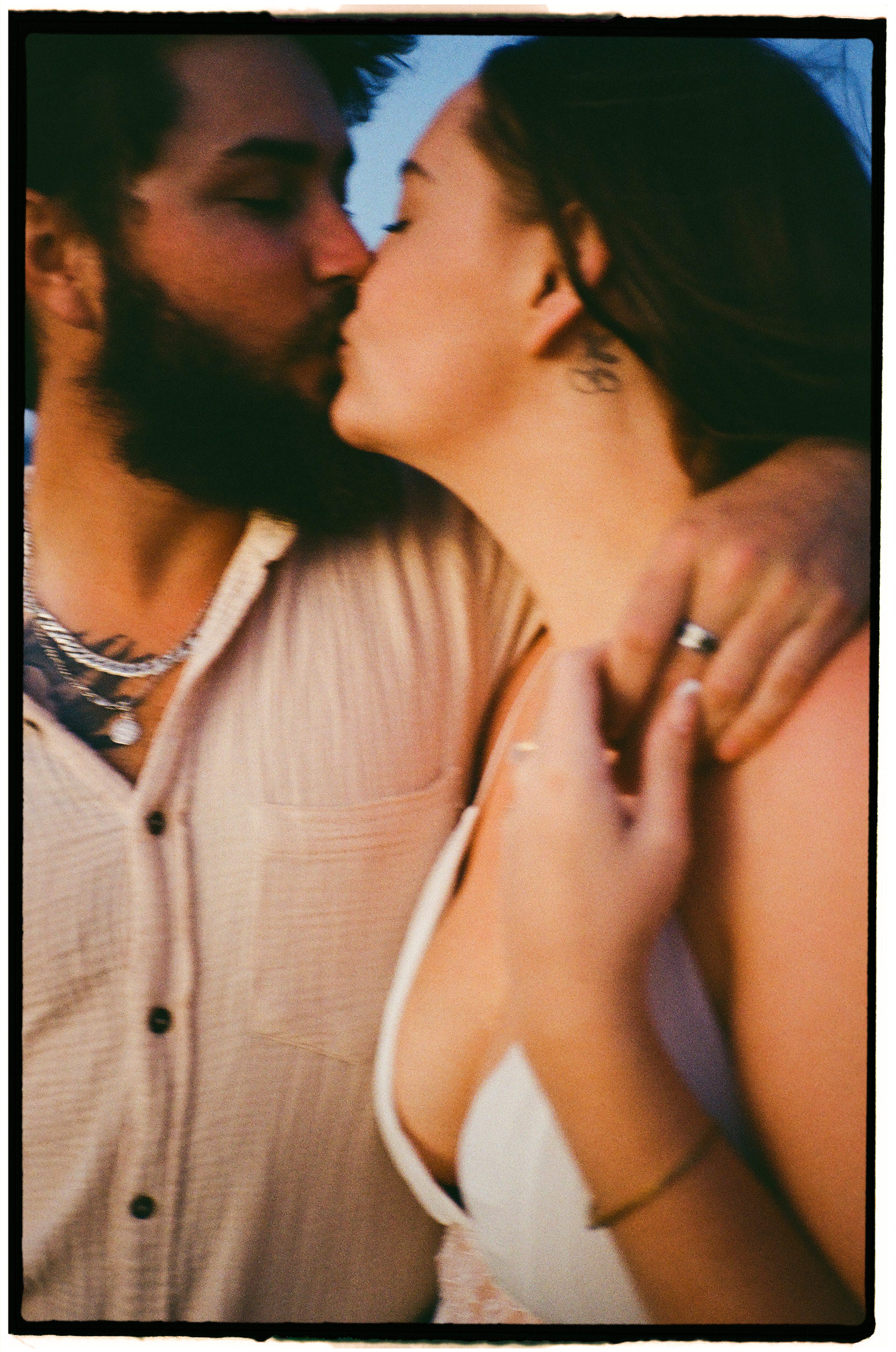 Couple celebrating after their surprise proposal at Sugarloaf Rock